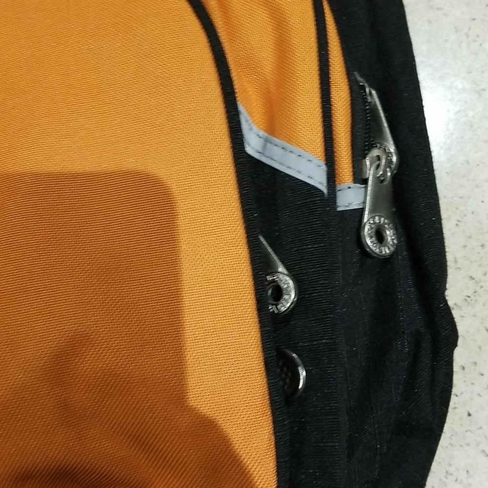 Multiple zippered pocket duffle bag NWT